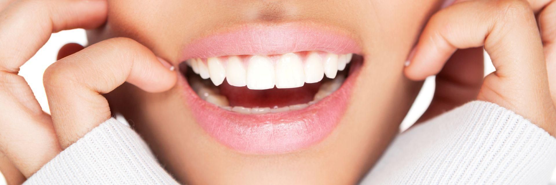 A model's mouth with dazzling white teeth