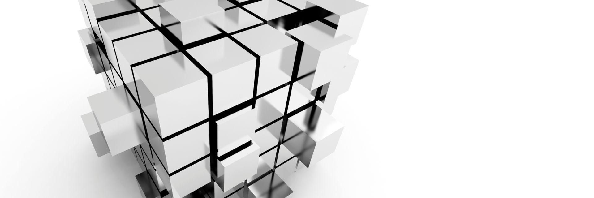 W&uuml;rfel aus Metall die sich wie ein dreidimensionales Puzzle zusammensetzen